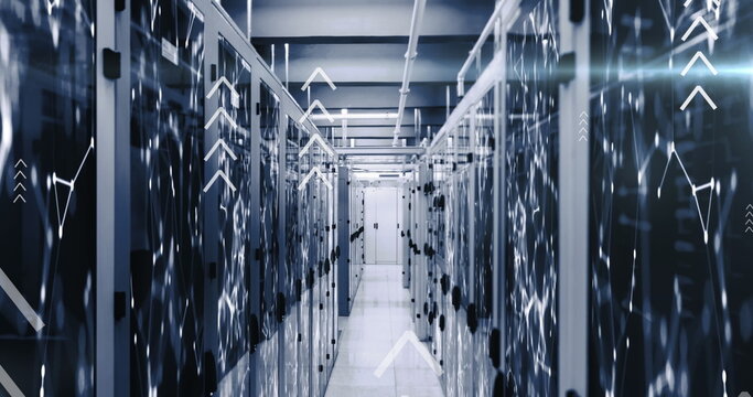 Image of arrows over connected dots on data server racks in server room