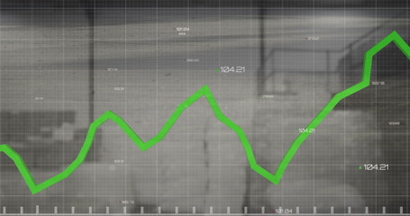 Image of graph with multiple changing numbers over empty office in background
