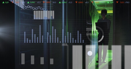 Image of statistical data processing over asian male engineer with laptop working at server room