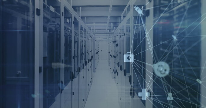 Image of spinning globe of medical icons, light spot and data processing against server room