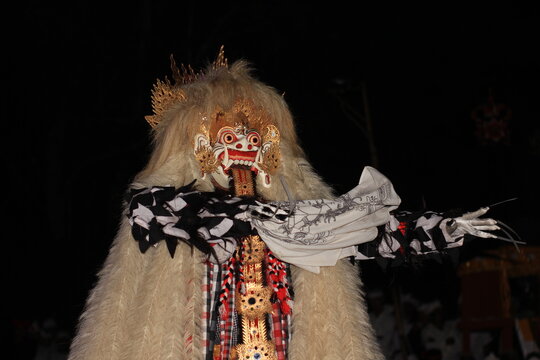 Rangda is the fearsome queen of the Leyaks in Balinese mythology, often depicted as a grotesque, monstrous woman with long, flowing hair, sharp claws, and a long, dangling tongue.