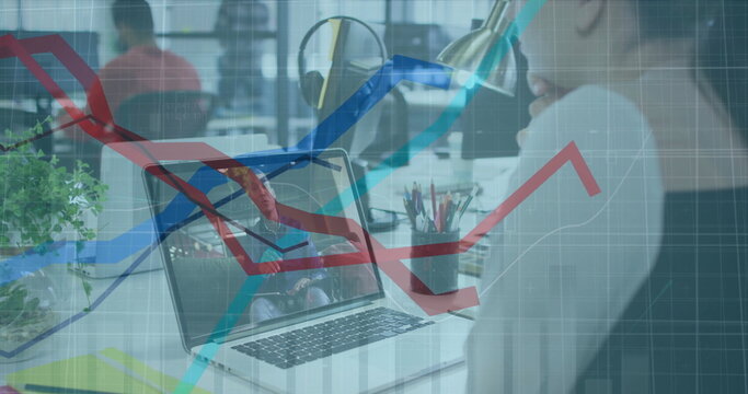 Image of infographic interface and caucasian woman discussing with man over image call in office