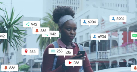 Image of social media data processing over african american woman using smartphone