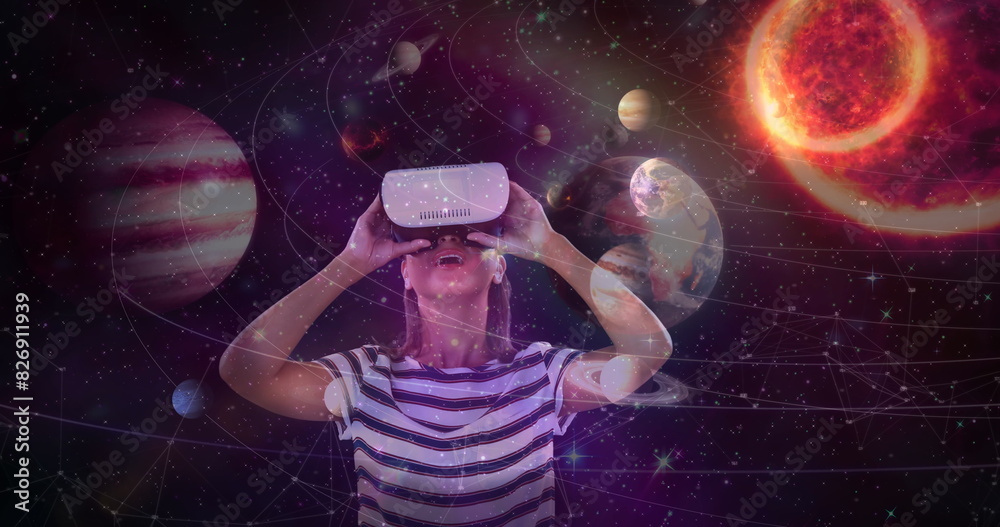 Wall mural digital composite of science composition woman watching the universe with augmented reality