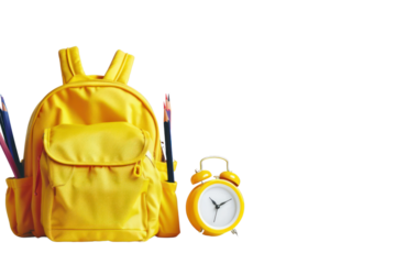 Yellow backpack with alarm clock and school supplies Back to school concept