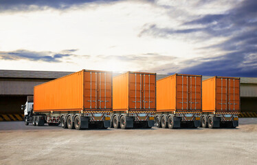 Semi Trailer Trucks on The Parking Lot at Warehouse. Truck Loading Goods at Warehouse. Container...