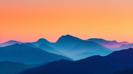 Fototapeta premium Serene Mountain Landscape at Sunset with Vibrant Sky, Serene mountain landscape at sunset with a vibrant sky. Layers of blue mountains under an orange gradient sky