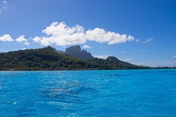 Bora Bora's extinct volcanoes rise above its beautiful lagoon