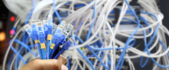Lots of RJ45 UTP Cat6 LAN internet network cable fiber optic and Ethernet cables for computer data...