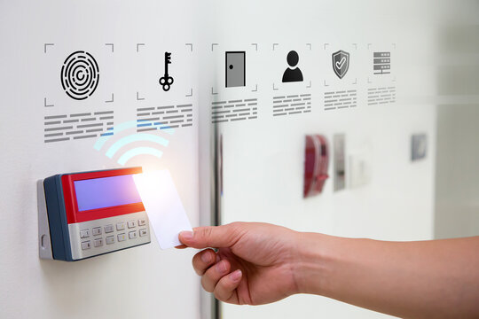 Hand scanning proximity ID card on reader access control system for door unlock with security icons for identity or verification identify for safety detect fingerprint scan or check attendance.