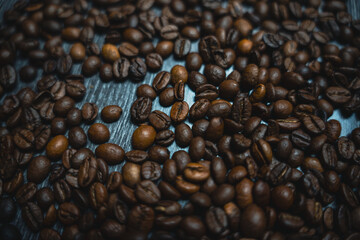 Colorful background with coffee beans in close-up