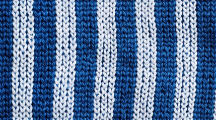 Blue and white striped pattern on knitted fabric