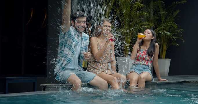 A group of tourist enjoys party and relax at pool bar in the hotel.