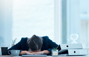 Woman, desk and sleep for burnout or tired, fatigue and exhausted corporate worker in office. Nap, overworked and deadline for project manager person, coffee and workload pressure and low energy