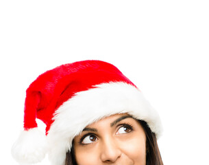 Woman, christmas hat or festive accessory on in white studio background for celebration or holiday season. Female person, thinking or daydreaming of event, party and gift giving with excitement