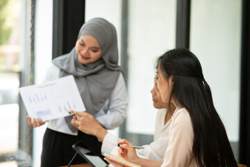 Asia business meeting   consultations of business people in the company's meeting room. 