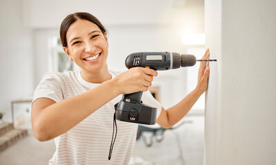 Portrait, wall and woman with drill tool for home with diy building, renovation or maintenance. Happy, design and female person with electric construction equipment for repairs at house or apartment.