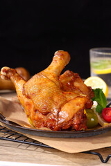 Roast chicken legs and rosemary