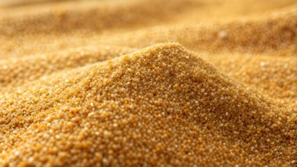 Golden Sand Pile: Close-up of a fine golden sand pile, perfect for construction and landscaping projects.
