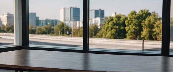 Fototapeta premium Empty table in front of blurred background, light office with panoramic windows,Mock up for display of product