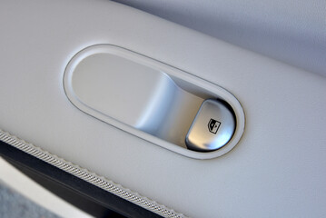 The button for raising the windows in the car