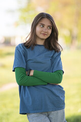 Portrait of a young beautiful long-haired girl outdoors.