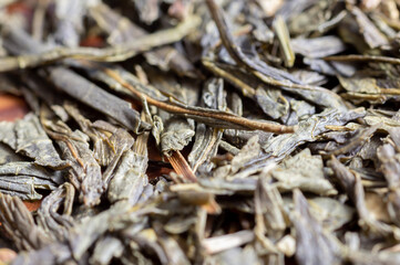 Green tea with ginger on a wooden background