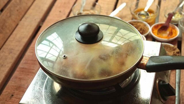 cooking pointed ground or potol or parwal shrimp curry with potato