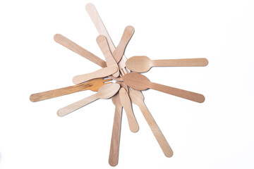 Wooden spoon and fork isolated on white background.