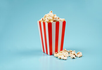red and white strip box full of popcorn background concept