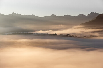 Misty sunrise in the morning in the Kitzbüheler Alps, Tyrol, Austria