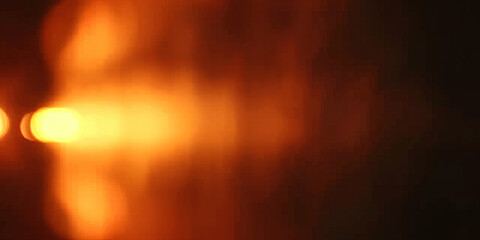 A blurred, glowing light in the dark background of an orange gradient.film texture burn overlay, Lens Optical Flare, Film Dust Overlay Effect, Vintage, copy space