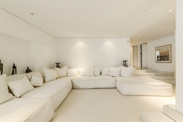 Panoramic white living room corner with sofa