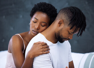 Black couple, hug and embrace in bedroom for romance, love and connection as partner in...