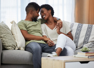 African man, couple and love with smile in home for commitment, marriage and together on sofa....