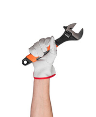 Hand holding metallic wrench in construction work. Industrial manual tool for repair and...