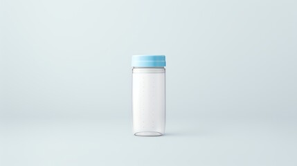 Minimalist image of a clear plastic bottle with a blue cap on a light background, perfect for product showcasing and advertising.