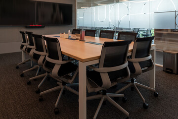 Interior of modern empty office building.Open ceiling design.Equipped with automatic lifting table and LCD screen.