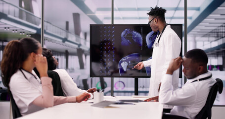 Physician Looking At Shoulder MRT Scan