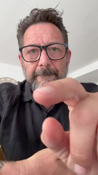 Fraud and scam website link concept virus with man in camera view thinking about click or not then do desperate expression and gesture for bad decision. Password security stolen data hacking web