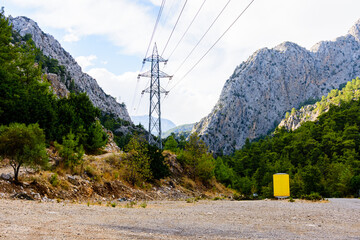 High voltage power line in canyon not far from the city Kemer. Antalya province, Turkey