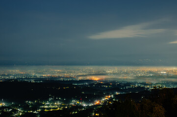 The beautiful city lights of Yogyakarta seen from Lintang Sewu Hill, Bantul, Yogyakarta