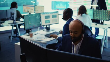 Management associate sharing insight on annual statistics during a call with the advisory board, providing initiatives to enhance operational performance metrics. Big data screen. Camera B. - Powered by Adobe