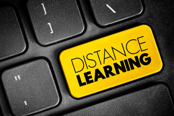 Distance learning - education of students who may not always be physically present at a school, text button on keyboard