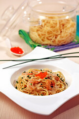 Spaghetti with prawns, cream and trout caviar.