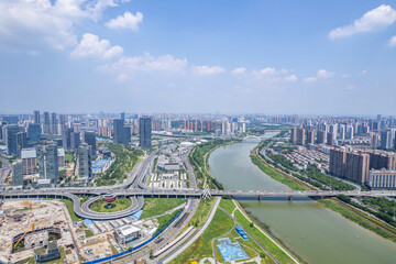Aerial photography of urban buildings along the Liuyang River in Changsha, China