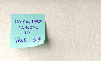 Mind, Mental Health and Encouragement Concepts. a Sticky Note with the Meaning of Care was taped on the white Wall