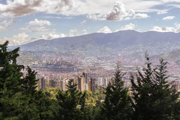 Fototapeta premium Creative panorama (cityscape) of Medellin, Medellín, Antioquia, Colombia, on a sunny day. The pictures shows condominiums.