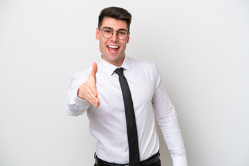 Business caucasian man isolated on white background shaking hands for closing a good deal