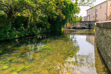 Fototapeta premium The Sorgue river at Isle sur la Sorgue, in Vaucluse, in Provence, France
